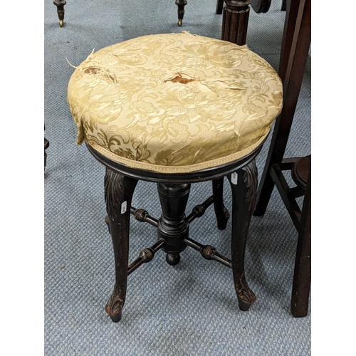 185 - A late Victorian mahogany framed swivel topped piano stool, 47cm h together with an early 20th centu... 