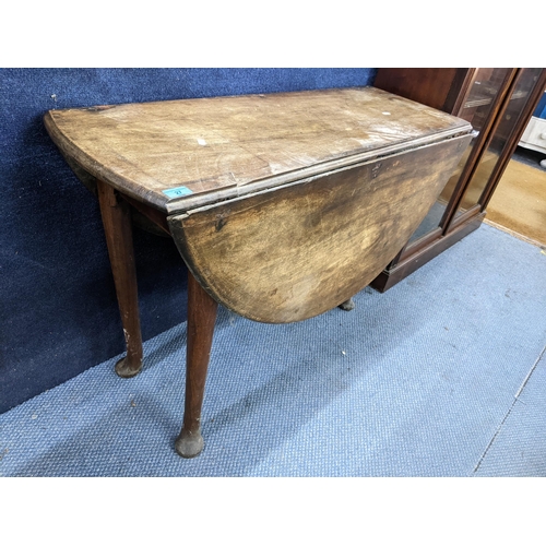 27 - A Georgian mahogany gateleg table 69.5cm h x 109.5cm w, together with a 1930s oak barley twist occas... 