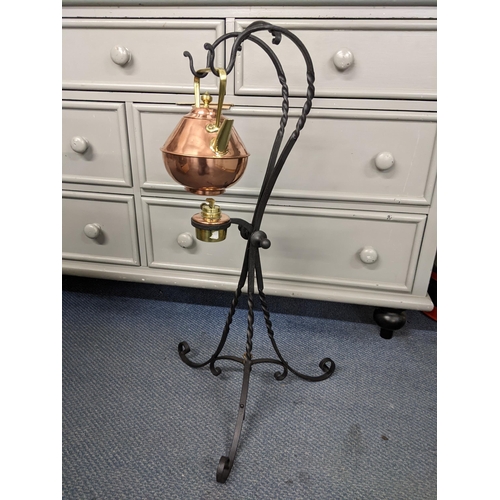 39 - An Arts & Crafts Behnam & Froud copper and wrought iron spirit kettle on stand with burner
Location:... 