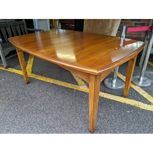 45 - A reproduction 'Windsor Furniture' extending walnut dining table with extra leaf
Location:LITTLE BLU... 