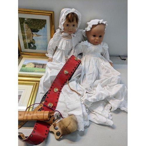 50 - A mixed lot to include two dolls, pictures to include two tapestries, dagger and other items
Locatio... 