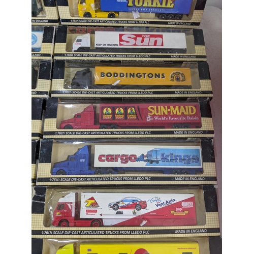 58 - A collection of various Cargo Kings lorries to include Nestle Yorkie, Montracon, Tuborg Beer and oth... 