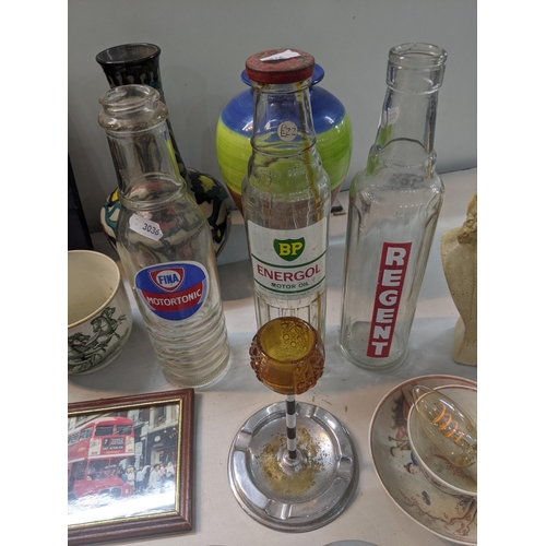 77 - A mixed lot to include a Royal Doulton vase, Fina Motortonic glass bottle, BP Energol Motor oil glas... 