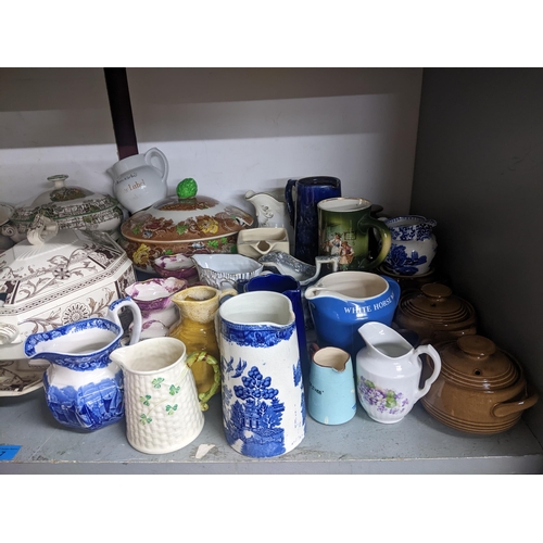 87 - A mixed lot of ceramics to include a collection of jugs, wash jugs set, tureens and other items to i... 