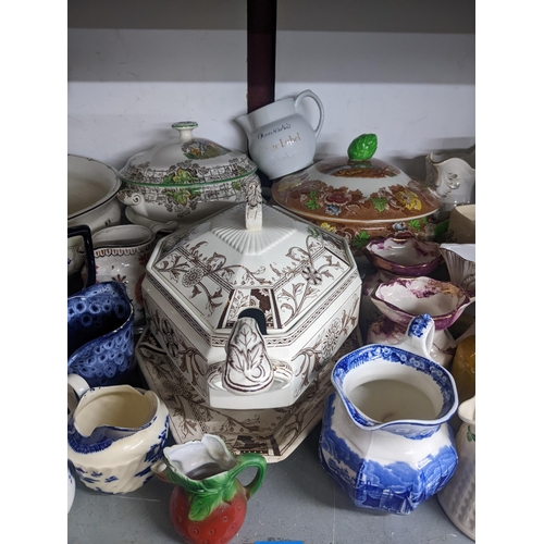 87 - A mixed lot of ceramics to include a collection of jugs, wash jugs set, tureens and other items to i... 