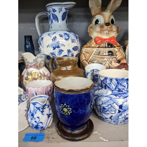 88 - A mixed lot to include a pair of Sitzendorf figurines, Doulton stoneware vase, teapots, Japanese Ima... 