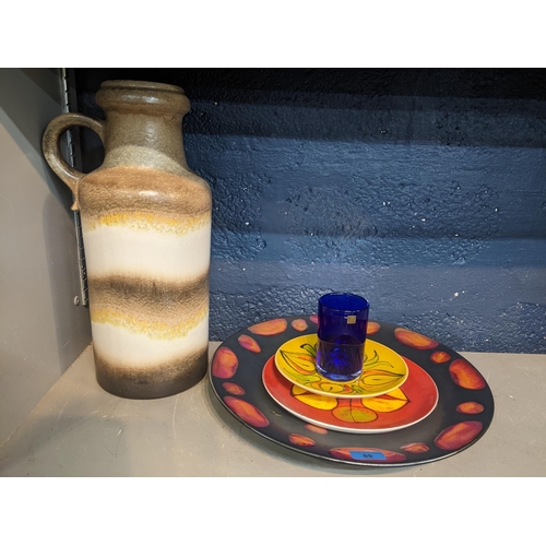 89 - A Poole pottery studio charger, Delphis plate, and Aegeon plate, a West German retro vase, and an Is... 