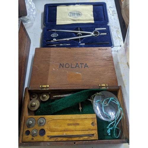 93 - A late 19th century brass sexton in a teak case, travellers scales, and drawing instruments
Location... 