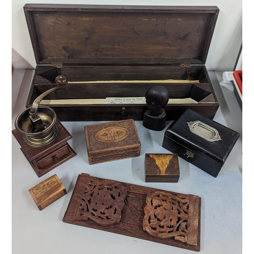 97 - A group of treen items to include an oak book-slide, coffee grinder and mixed boxes-
Location:RWM