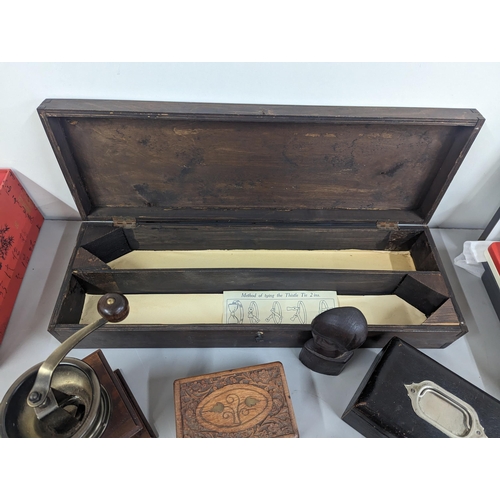 97 - A group of treen items to include an oak book-slide, coffee grinder and mixed boxes-
Location:RWM