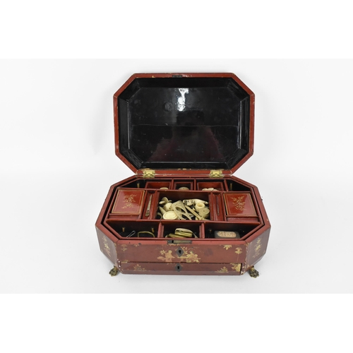 104 - A 19th century Chinese export red and gilt lacquer sewing box,  decorated with Chinese figures and f... 