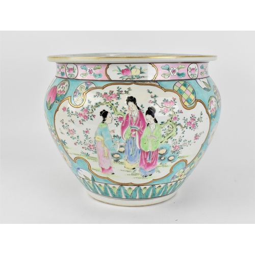 106 - A large Chinese export fish bowl, 20th century, with bats and clouds to the rim above a central cart... 