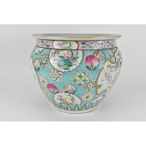 106 - A large Chinese export fish bowl, 20th century, with bats and clouds to the rim above a central cart... 