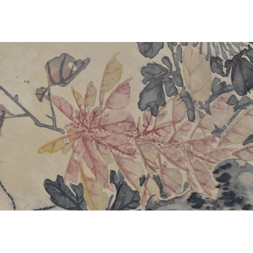 120 - A Chinese watercolour on silk scroll painting of chrysanthemums, inscribed and with red seal mark to... 