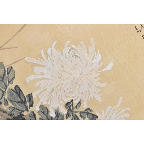 120 - A Chinese watercolour on silk scroll painting of chrysanthemums, inscribed and with red seal mark to... 