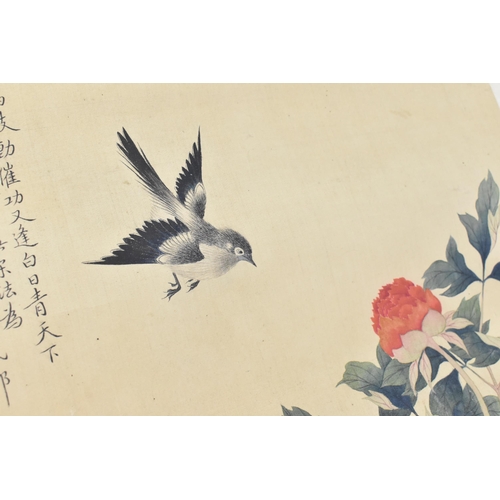 121 - A 20th century Chinese watercolour on silk scroll painting of peonies and bird, inscribed and with r... 