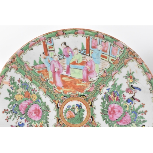 15 - Two Chinese Canton famille rose chargers, mid 19th century, of circular form with fan vignettes depi... 