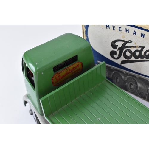 197 - Shackleton tin plate FG Foden clockwork flatbed truck, with green cab and green back, grey mud guard... 