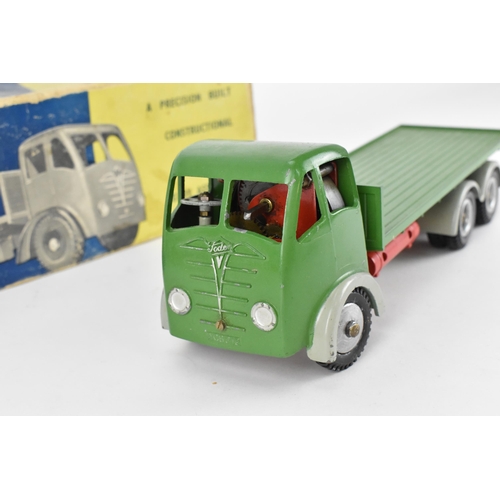 197 - Shackleton tin plate FG Foden clockwork flatbed truck, with green cab and green back, grey mud guard... 