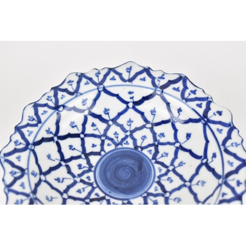 42 - A Chinese export Ming style blue and white porcelain footed dish, in the Persian taste made for the ... 