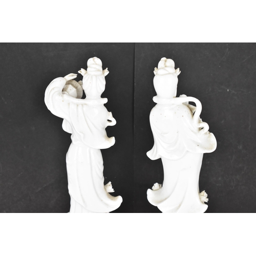 67 - Two Chinese Blanc-de-Chine figures of Guanyin, Dehua, early 20th century,  modelled standing raised ... 