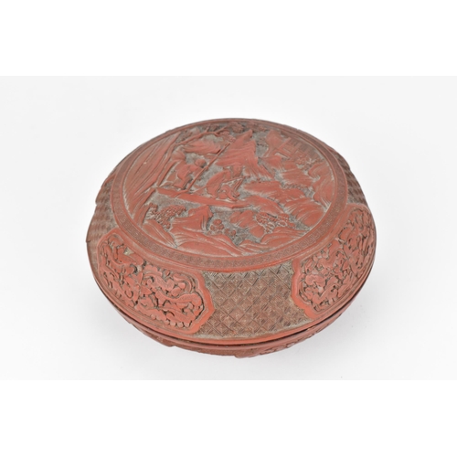 68 - A Chinese Qing dynasty red cinnabar lacquer 'chun' box and cover, 19th century, of circular form, th... 