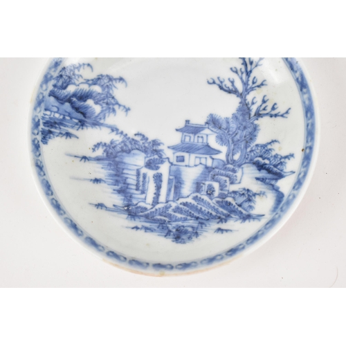 71 - A Chinese Nanking Cargo blue and white teacup and saucer, 18th century, the undersides with Christie... 