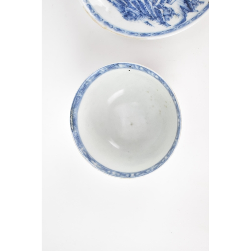 71 - A Chinese Nanking Cargo blue and white teacup and saucer, 18th century, the undersides with Christie... 