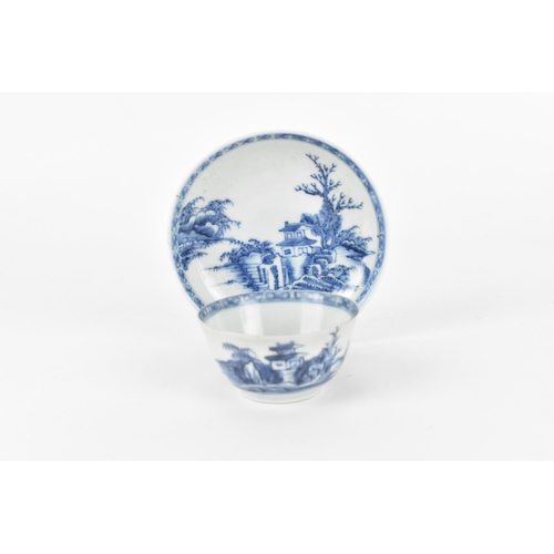 71 - A Chinese Nanking Cargo blue and white teacup and saucer, 18th century, the undersides with Christie... 