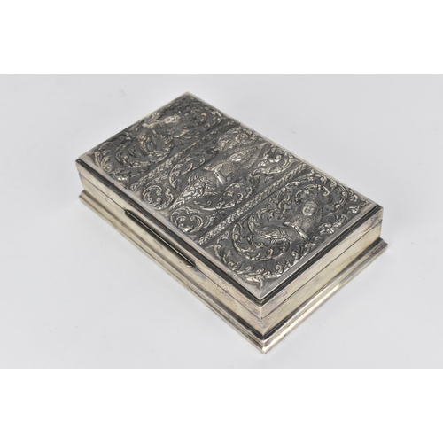 72 - A South East Asian sterling silver cigarette box, late 19th/early 20th century, designed with three ... 