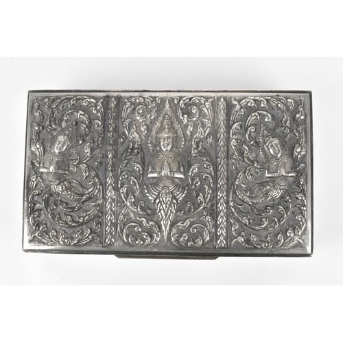 72 - A South East Asian sterling silver cigarette box, late 19th/early 20th century, designed with three ... 