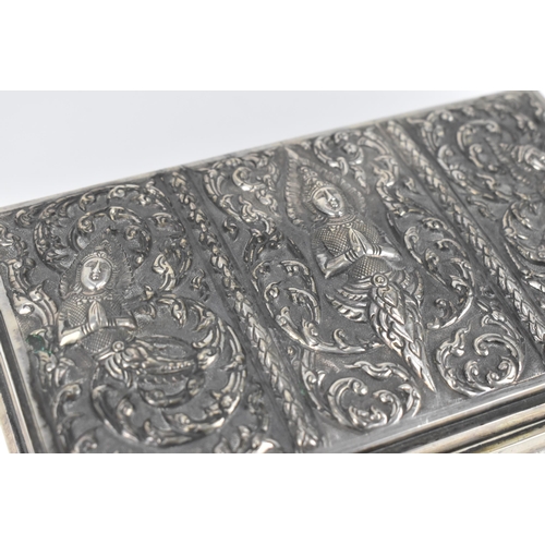 72 - A South East Asian sterling silver cigarette box, late 19th/early 20th century, designed with three ... 