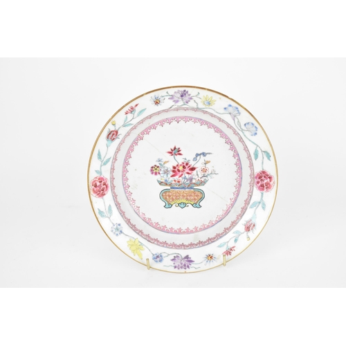 74 - An early 18th century Chinese porcelain plate, Yongzheng period (1723-35), with polychrome enamel fl... 