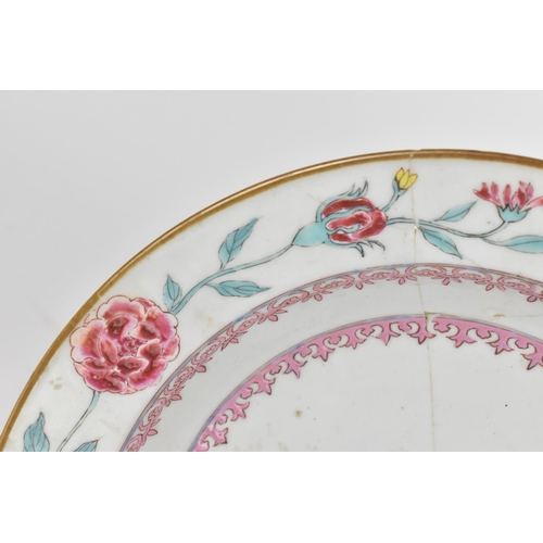 74 - An early 18th century Chinese porcelain plate, Yongzheng period (1723-35), with polychrome enamel fl... 