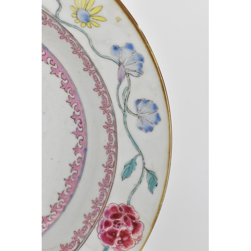 74 - An early 18th century Chinese porcelain plate, Yongzheng period (1723-35), with polychrome enamel fl... 