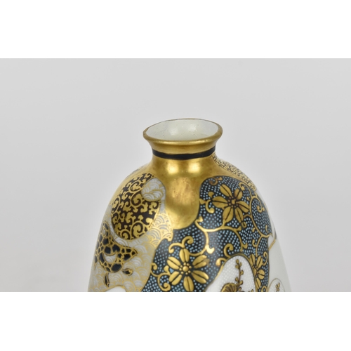 76 - A small Japanese Kutani porcelain bud vase, Meiji period, designed with various shaped patterns with... 