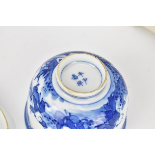 78 - A small Chinese blue and white teacup and lid, with apocryphal four character mark to underside, tog... 