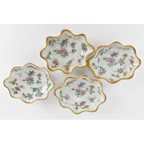 92 - A set of Chinese Qing dynasty porcelain leaf dishes, with enamel crickets and flowers, and gold rim,... 