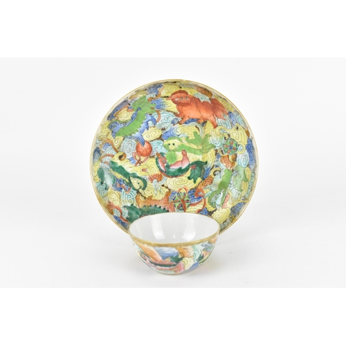 94 - A Chinese late Qing dynasty famille rose Buddhist lions bowl, 19th century, the lions playing with b... 