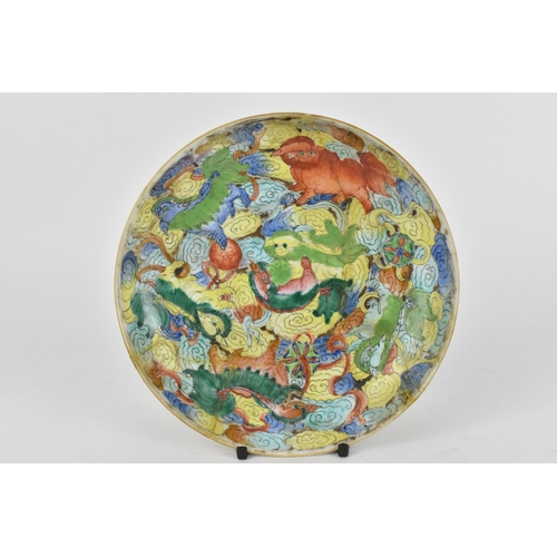 94 - A Chinese late Qing dynasty famille rose Buddhist lions bowl, 19th century, the lions playing with b... 