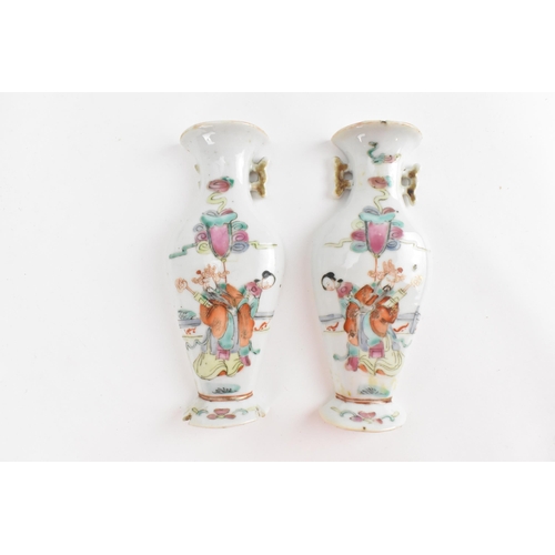 95 - A pair of Chinese Famille Rose porcelain wall pockets, probably 18th century, in the shape of balust... 