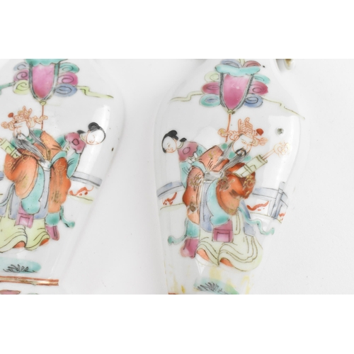 95 - A pair of Chinese Famille Rose porcelain wall pockets, probably 18th century, in the shape of balust... 