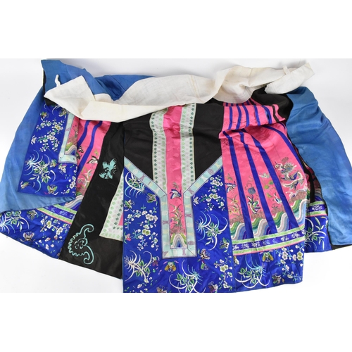 97 - A Chinese Han embroidered silk qun/skirt, late 19th/early 20th century, in pink, blue and black, wit... 