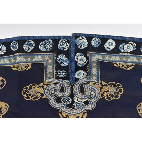 98 - A Chinese Qing dynasty embroidered silk jacket, in navy with gilt roundels and floral details to the... 