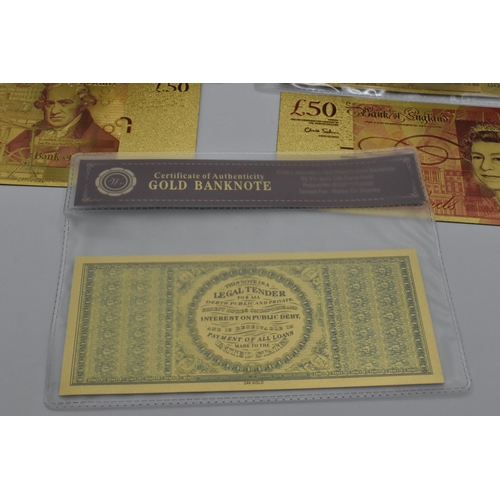 140 - A group of Gold banknotes in plastic wallets to include, 24k stamped one Dollar, and 100 Dollar, alo... 