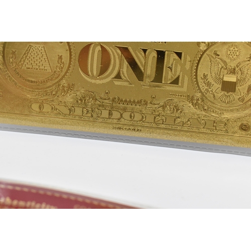 140 - A group of Gold banknotes in plastic wallets to include, 24k stamped one Dollar, and 100 Dollar, alo... 