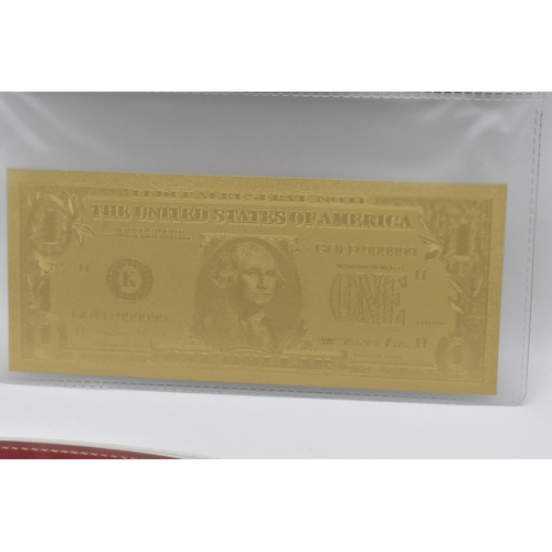 140 - A group of Gold banknotes in plastic wallets to include, 24k stamped one Dollar, and 100 Dollar, alo... 