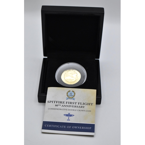 148 - A 9ct gold Spitfire First Flight 80th Anniversary Commemorative double crown coin, by The Bradford E... 