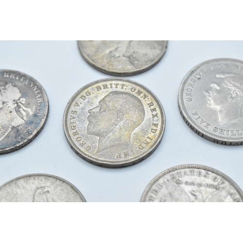 152 - A group of mixed British and American coinage to include a 1821 crown 1921 Morgan Dollar, a pair of ... 