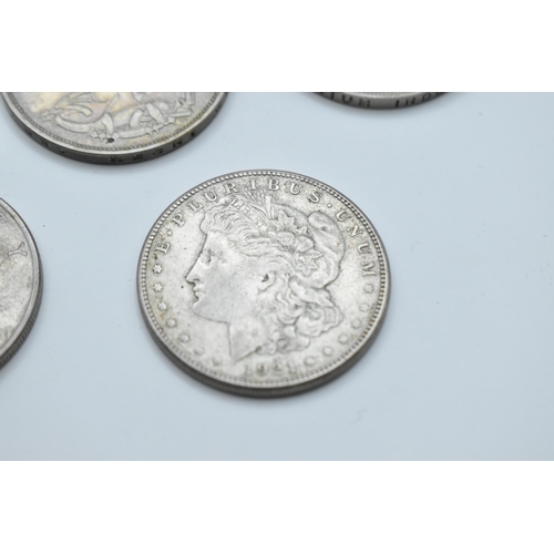 152 - A group of mixed British and American coinage to include a 1821 crown 1921 Morgan Dollar, a pair of ... 